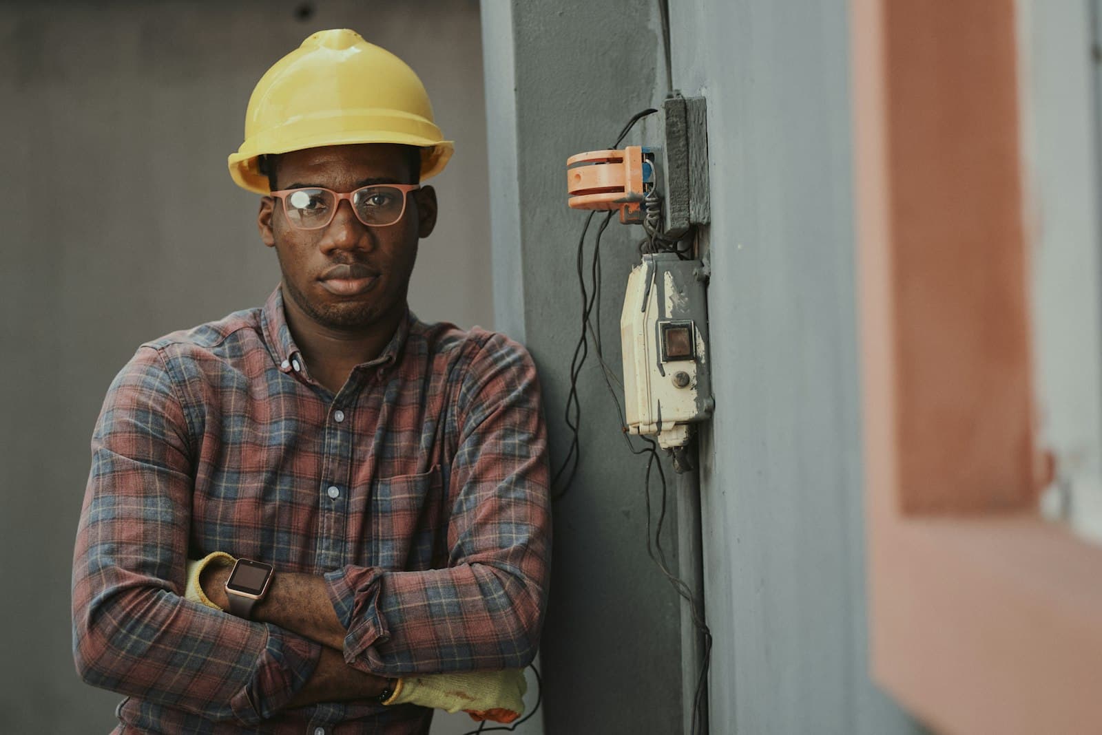 Technician in safety gear at a job site